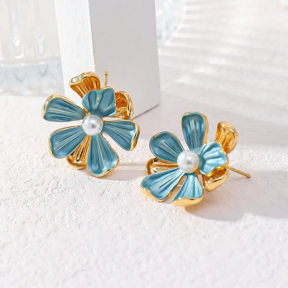 Flower pearl light luxury earrings for women in ER1297 colour with alloy build and electroplated finish