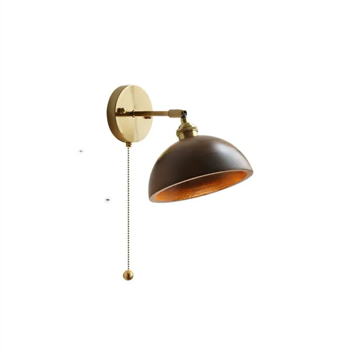Nordic style wooden wall mounted bedside lamp in a bedroom setting