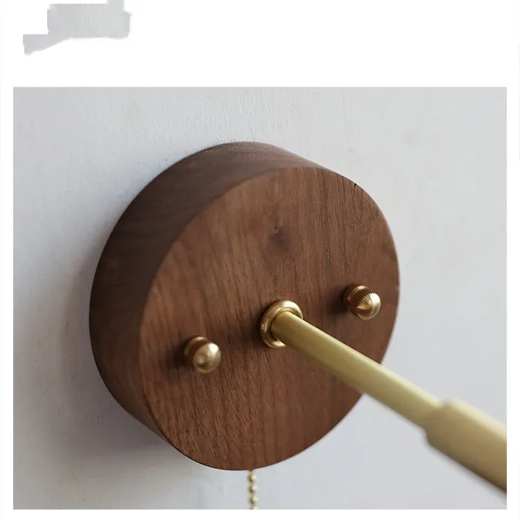 Nordic style wooden wall mounted bedside lamp in a bedroom setting