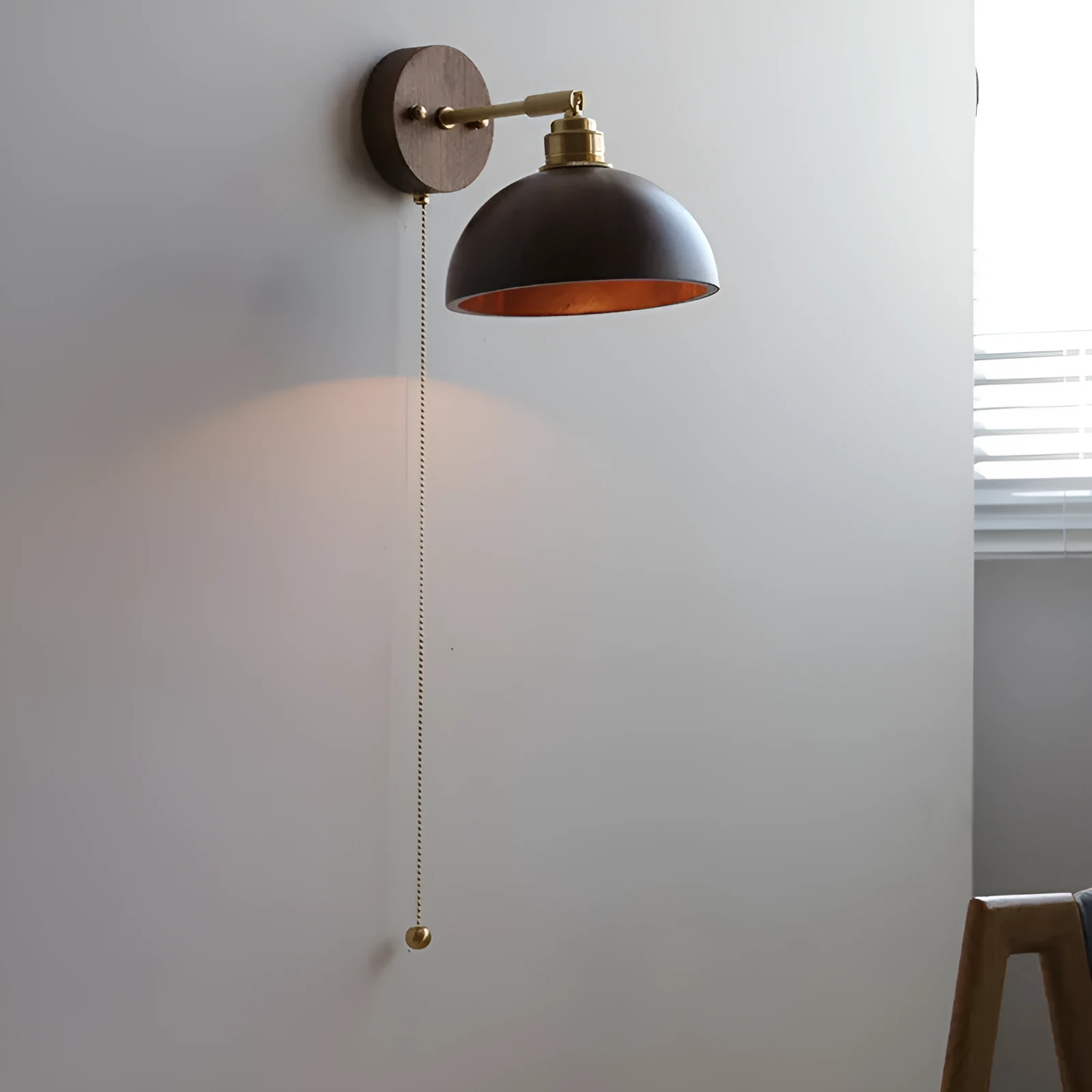 Nordic style wooden wall mounted bedside lamp in a bedroom setting