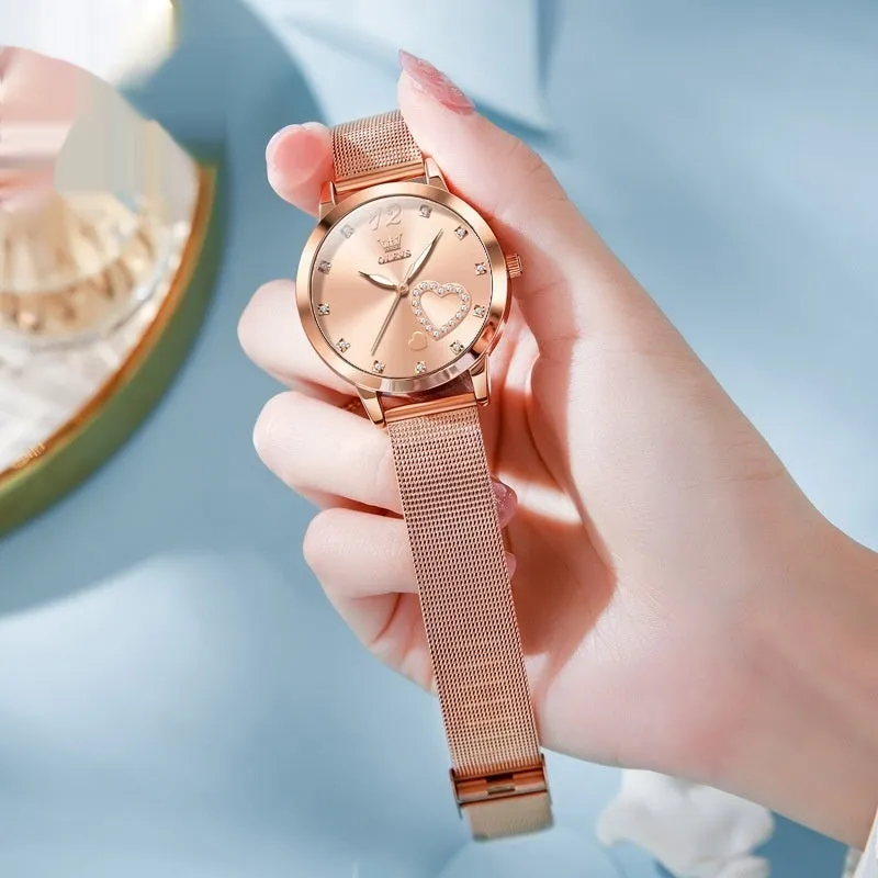 Women's fashion watch with rose alloy case, coloured dial, and stainless steel mesh strap.