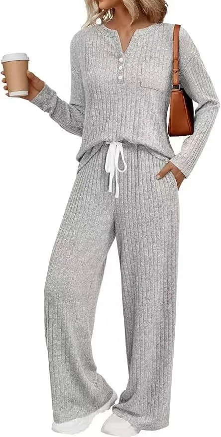 Women's knitted V-neck long coat with striped pattern and matching trousers in apricot colour