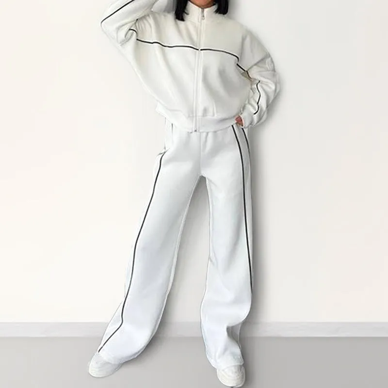 Casual polyester suit set showing a long sleeve mock neck hoodie and striped trousers on a model.