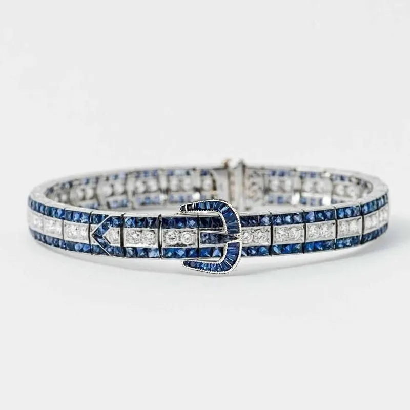 High-carbon drill gold-plated 925 silver bracelet in vivid blue on white background