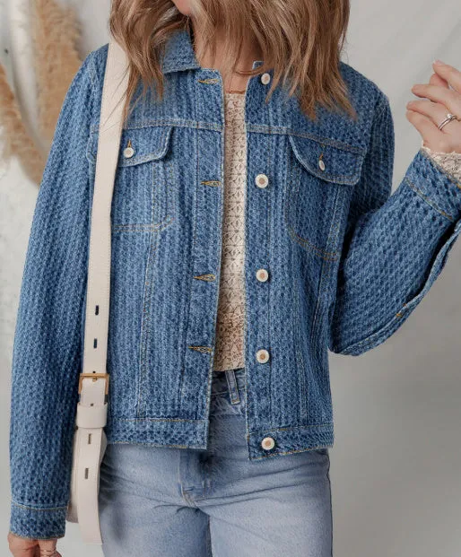 Blue double flap pocket denim textured button down jacket for women front view