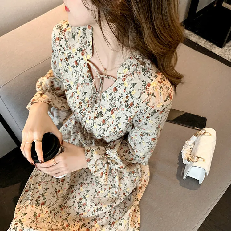 Retro waist-cinching A-line floral dress for women in apricot polyester fabric available in sizes S to 2XL