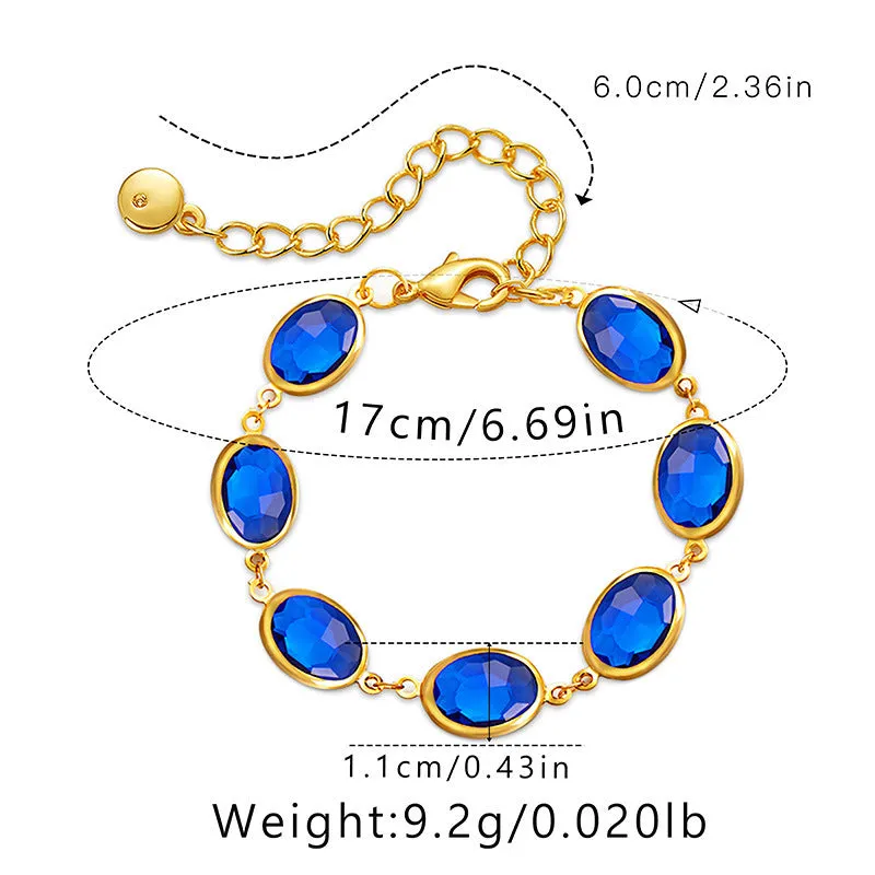 Geometric copper bracelet with blue inlaid glass elliptical design for women.