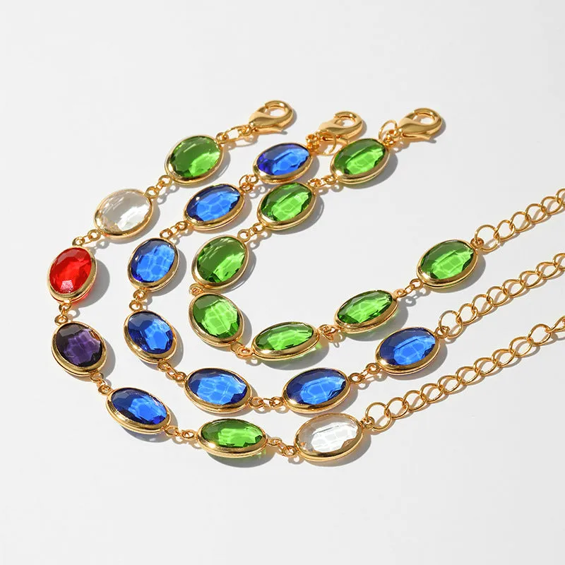 Geometric copper bracelet with blue inlaid glass elliptical design for women.