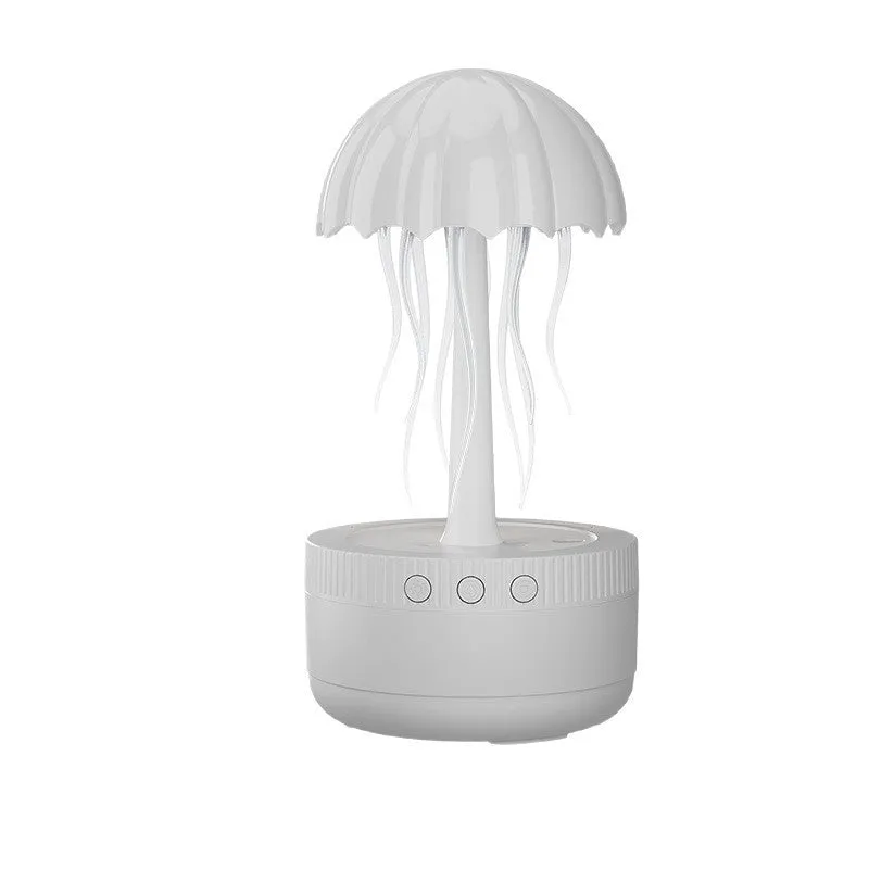 White USB rotating colorful light humidifier with large mist output on a desktop surface