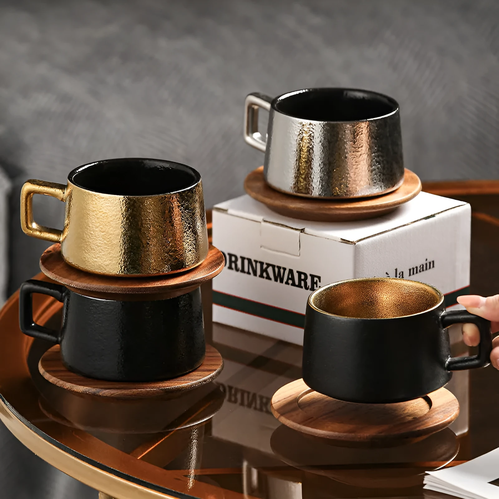 Gold and silver-plated gift boxes containing a solid colour 250ml tumbler cup and optional gift bag.