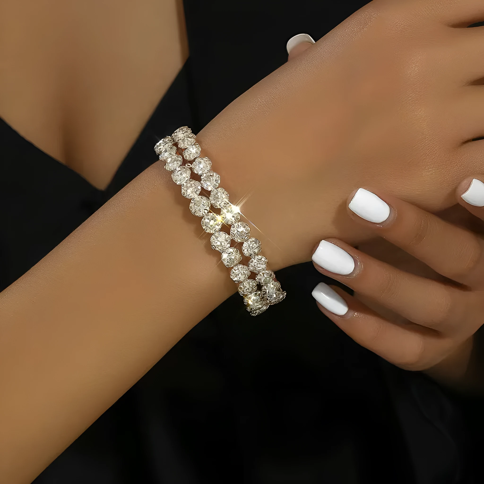 Silver elastic bracelet with double row of large rhinestones and wide opening design
