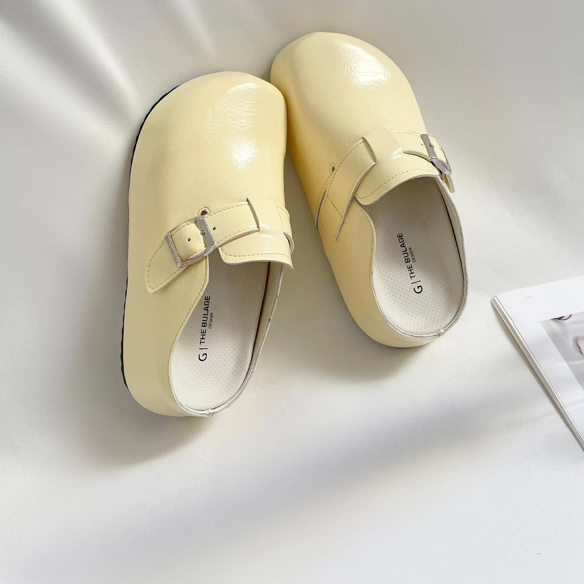 Flat buckle casual sneakers with round toe in yellow, creamy-white, silver, and black colour options