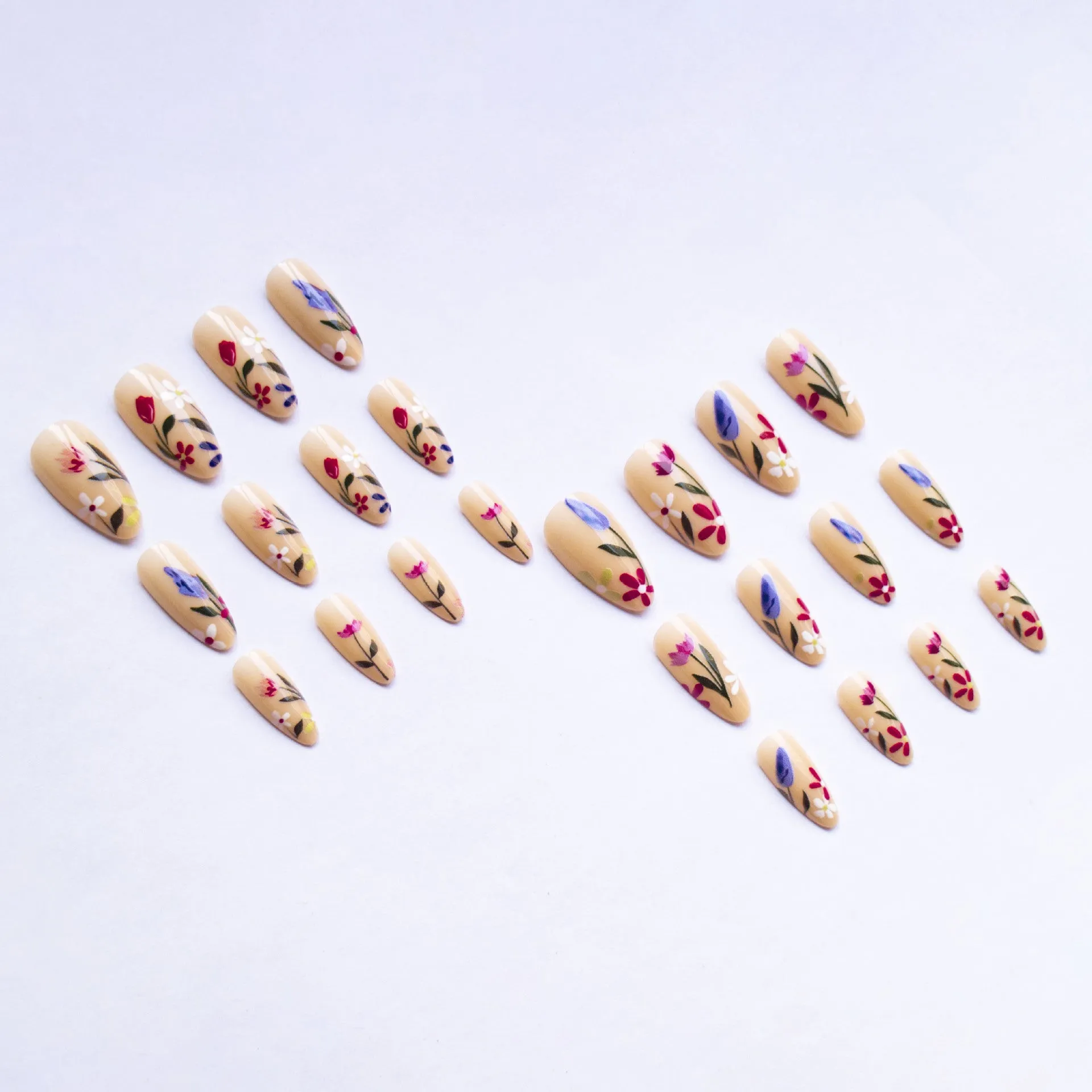 Removable flower pattern nail art set for almond-shaped nails in a rose and tulip design.