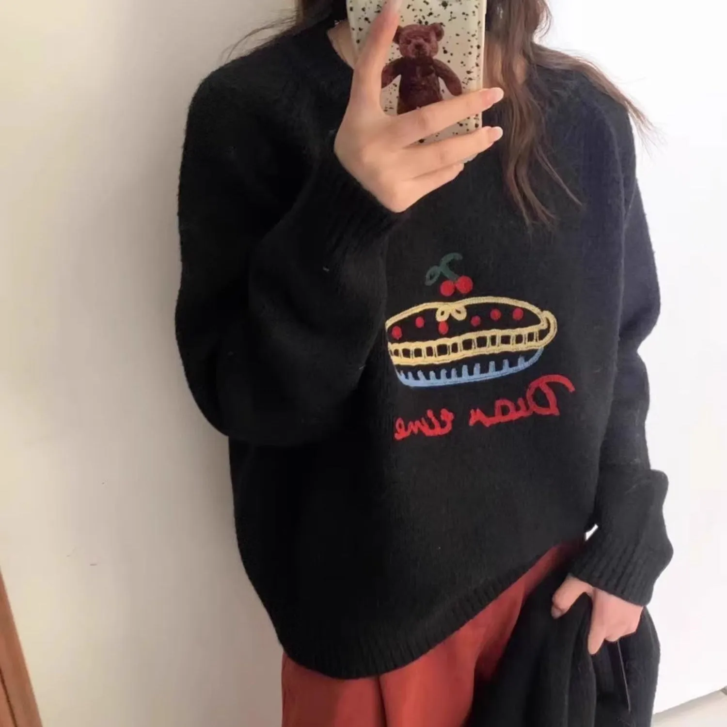 Women's loose fit round neck embroidered cartoon sweater in beige with long sleeves and acrylic spandex fabric