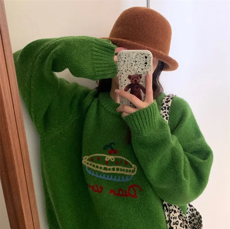 Women's loose fit round neck embroidered cartoon sweater in beige with long sleeves and acrylic spandex fabric