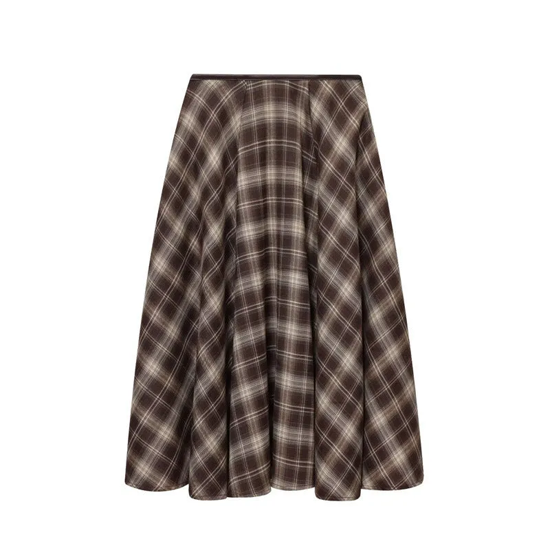 Women's loose plaid midi dress in brown with high-waisted half-skirt and check pattern on a white background