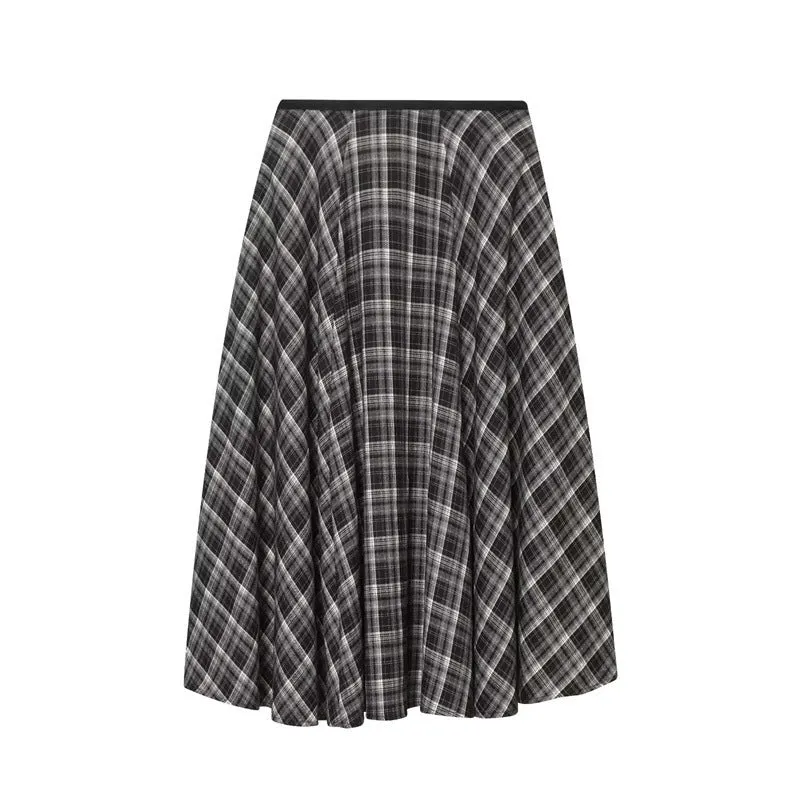 Women's loose plaid midi dress in brown with high-waisted half-skirt and check pattern on a white background