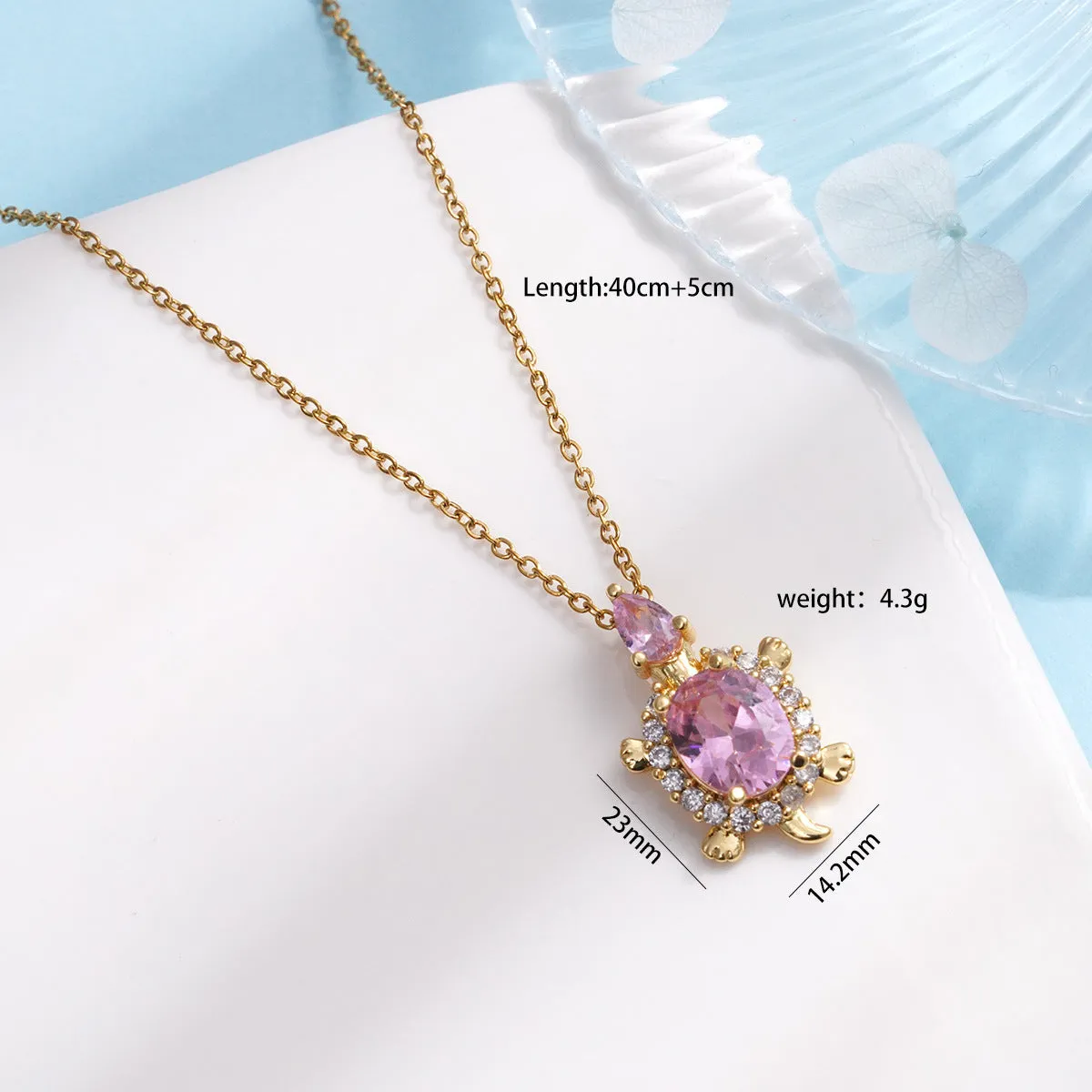 Gold-plated copper sea turtle pendant necklace with mixed gemstone inlay and zirconium encrustation on titanium steel chain