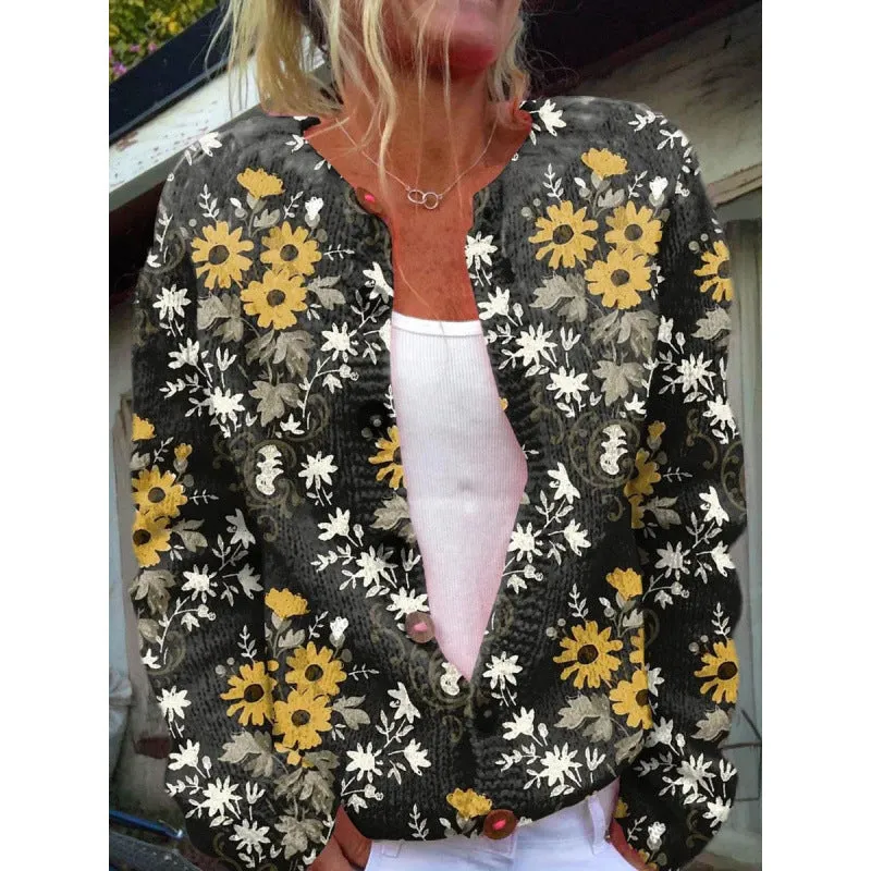Yellow women's knitted cardigan coat with a raised 3D pattern, shown unbuttoned.