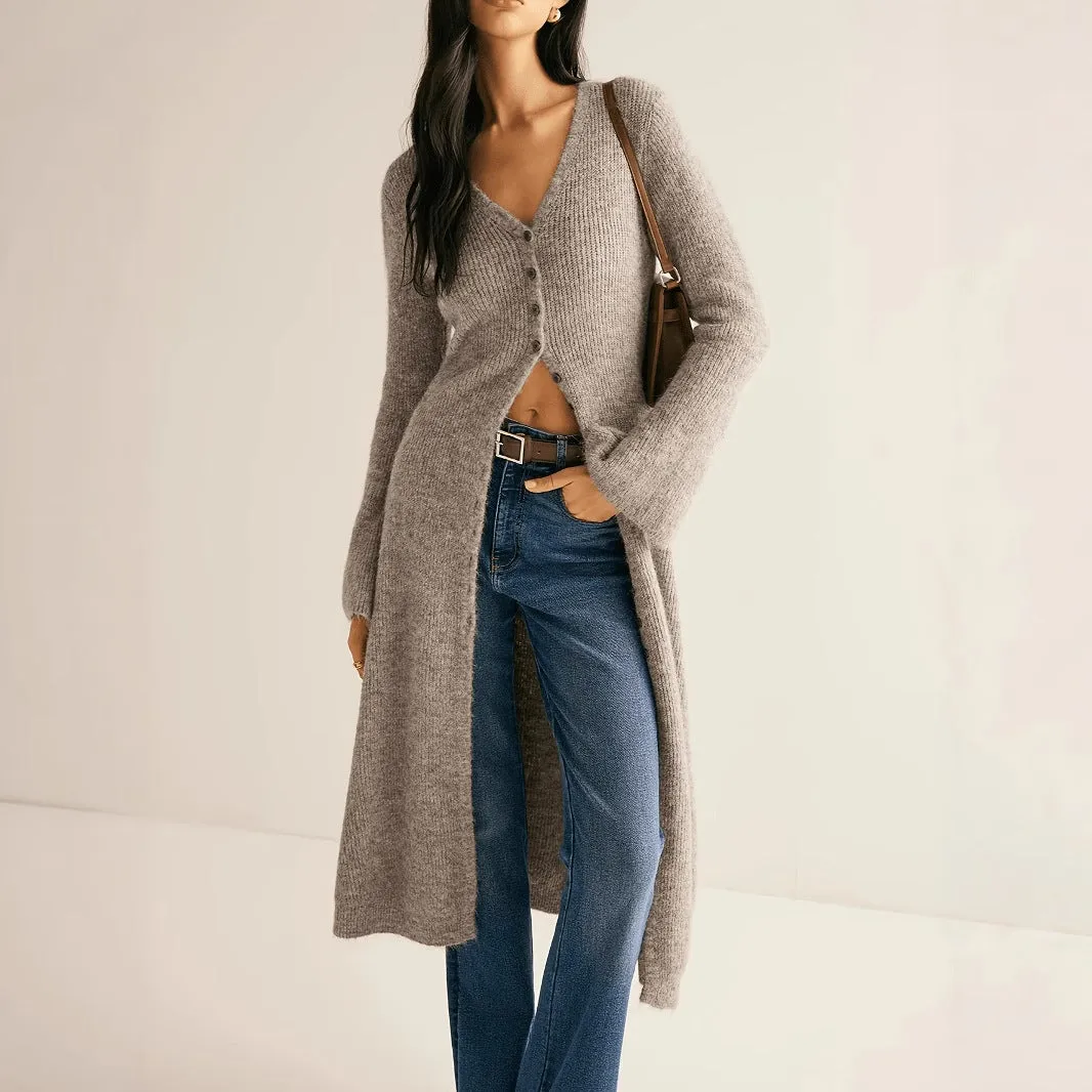 Khaki coloured women's long sleeve button-front cardigan coat on a hanger.