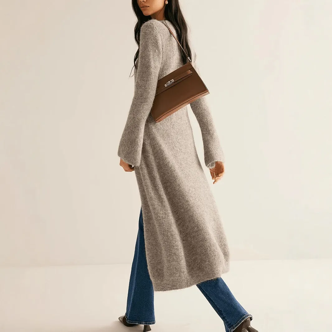 Khaki coloured women's long sleeve button-front cardigan coat on a hanger.