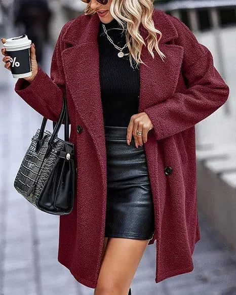 Women's mid-length coat with fur collar, button front, and side pockets in black
