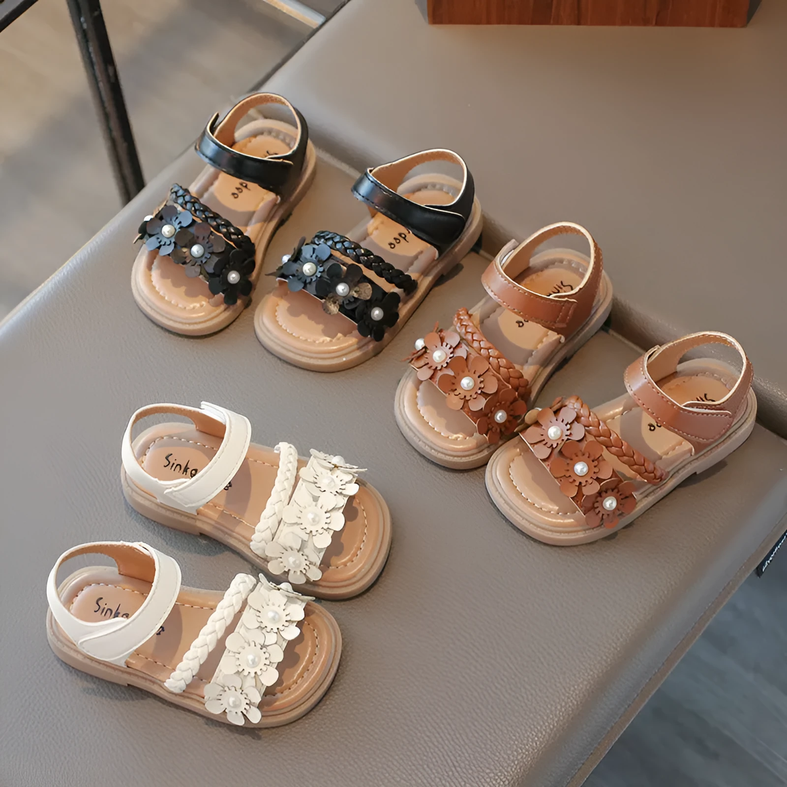 Girls soft bottom sandals with Velcro fastening and artificial leather upper in solid colours