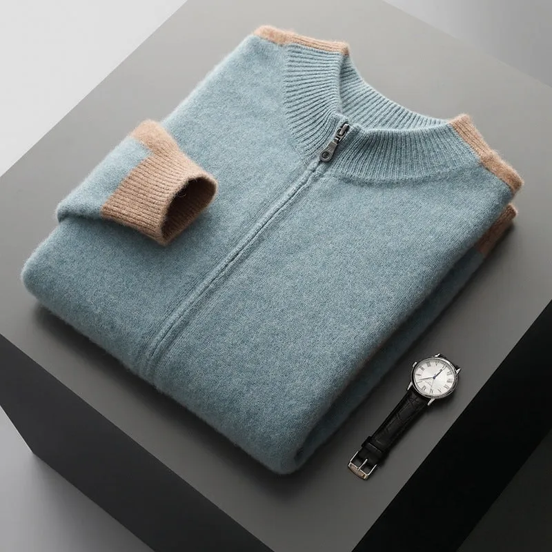 Man wearing a dark blue half turtleneck zip cardigan with loose fit and long sleeves