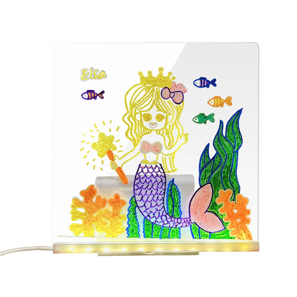 Transparent acrylic reusable LED drawing board with USB light and adjustable stand, showing rainbow drawing