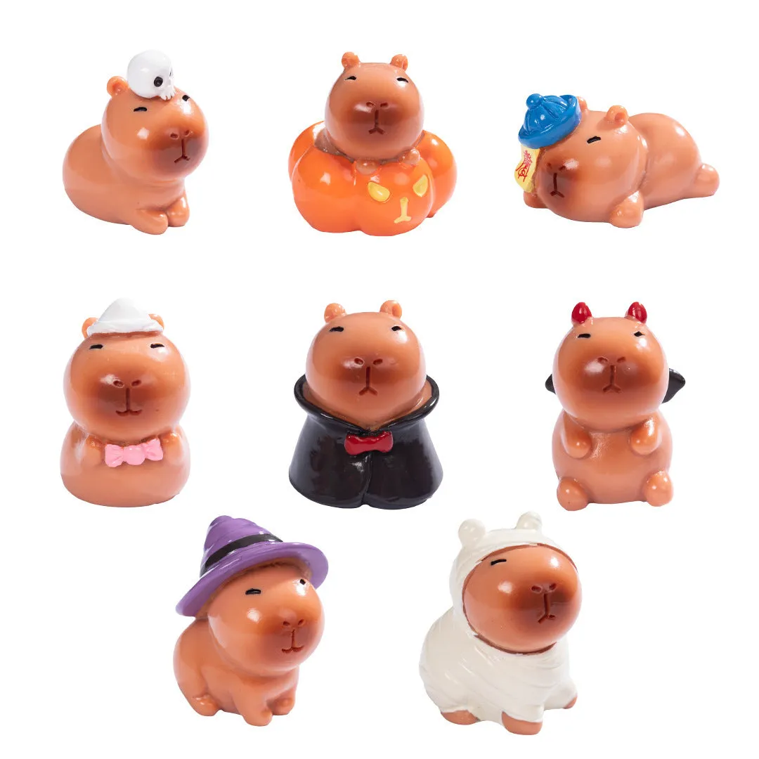 Eight different Halloween-themed capybara resin figurines displayed together
