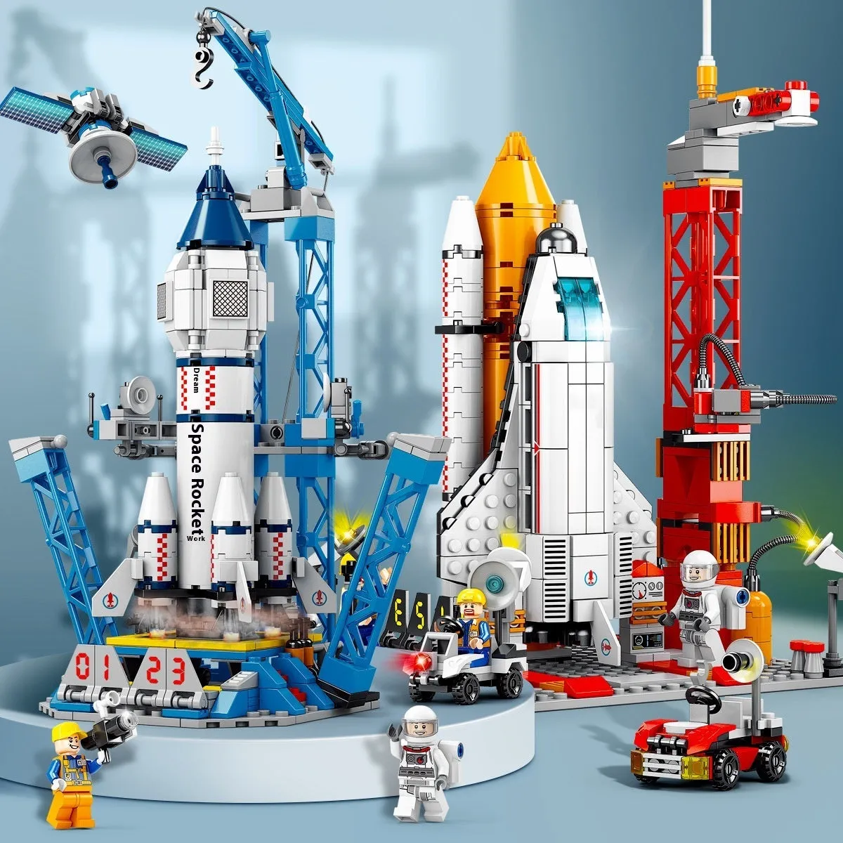 Colour box packaging of space rocket building blocks featuring space station, starship, Apollo 5, Falcon Heavy rocket, and dragon flying ship sets