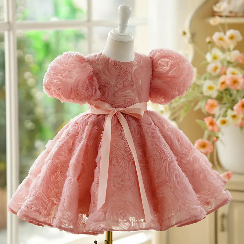 Children's girls birthday pettiskirt in bean pink with layered polyester design, front view