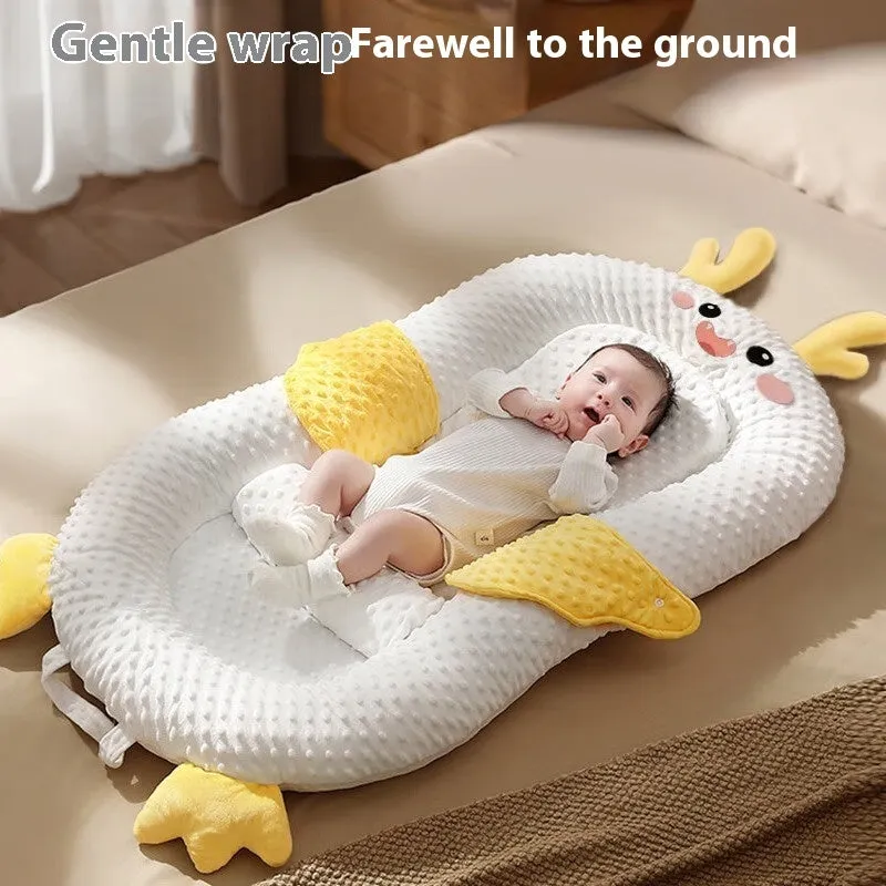 Foldable newborn baby sleeping slope mattress in Little Dragon design for reflux relief on soft fabric
