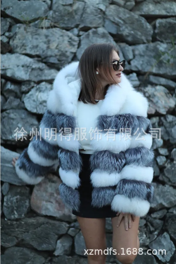 Loose hooded women's coat in artificial fur, shown in brown and white silver fox colours.