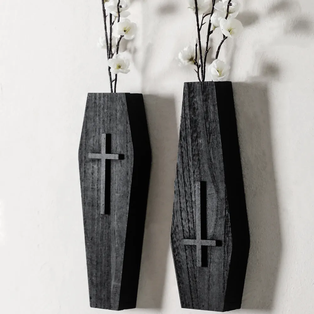 Black wooden cross wall vase shelf with open top for stems, 27cm tall, wall-mounted pendant design