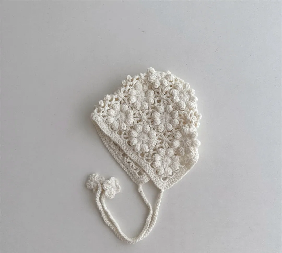Breathable lace-up earflap winter hat for girls in beige with dome crown and jacquard weave