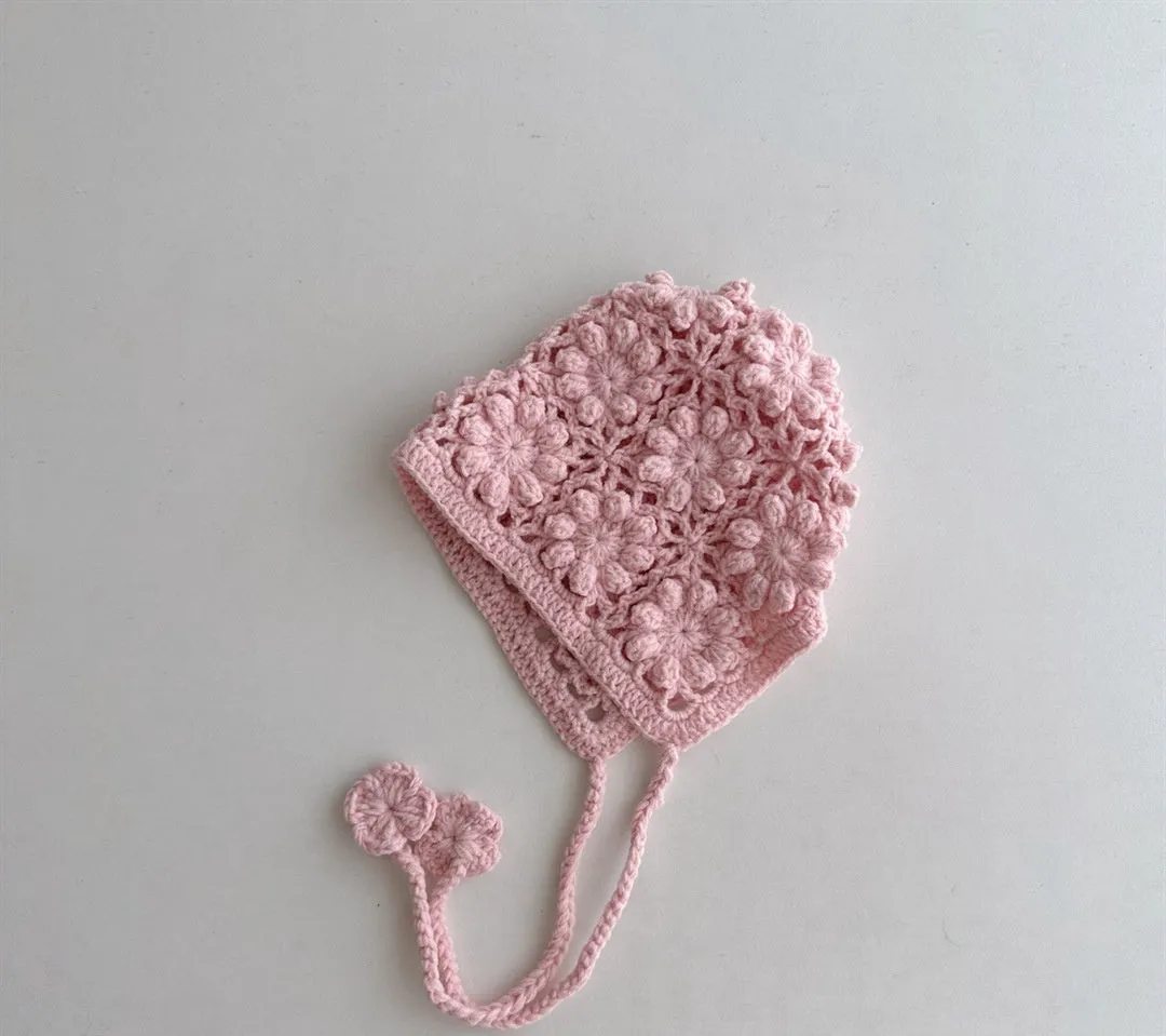 Breathable lace-up earflap winter hat for girls in beige with dome crown and jacquard weave