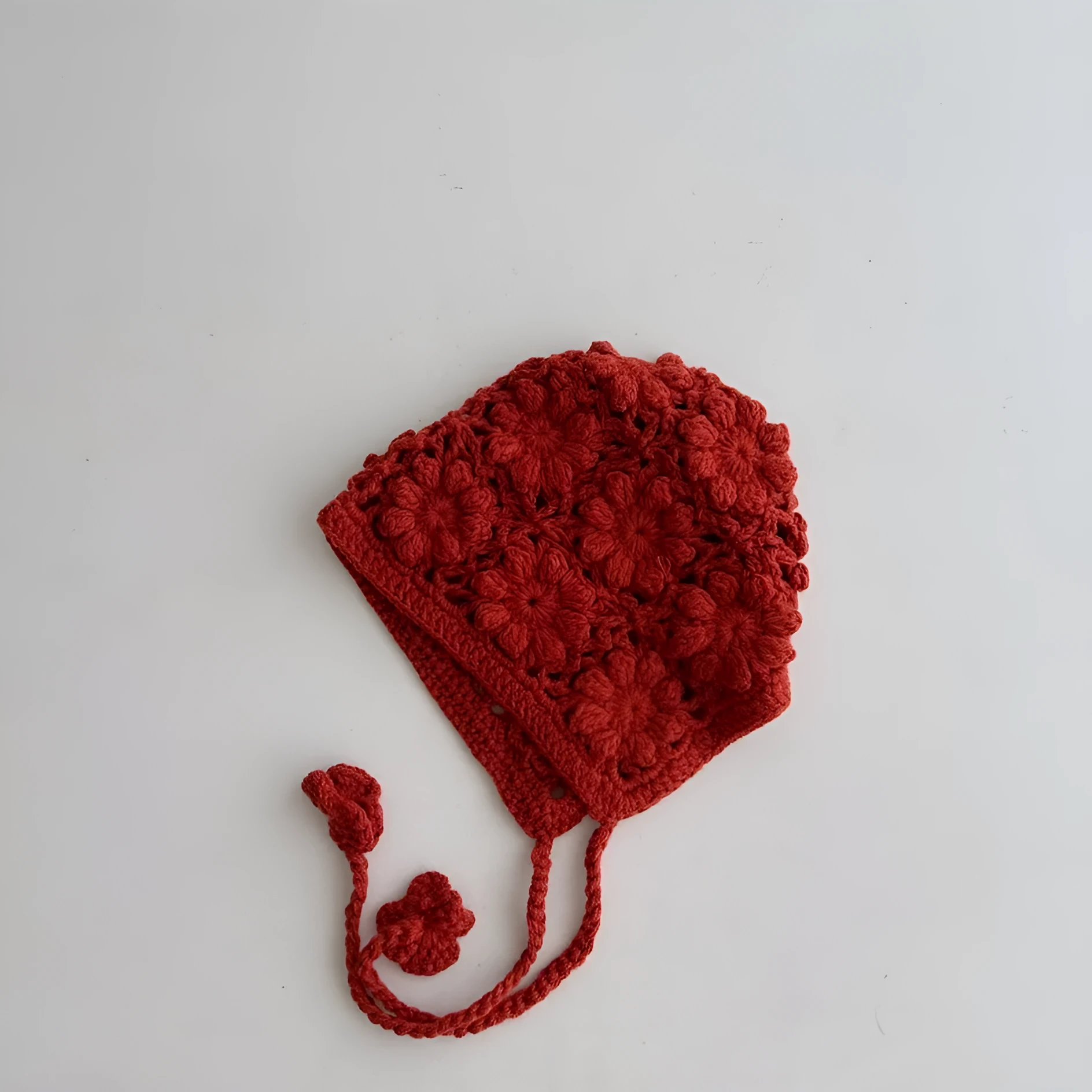 Breathable lace-up earflap winter hat for girls in beige with dome crown and jacquard weave