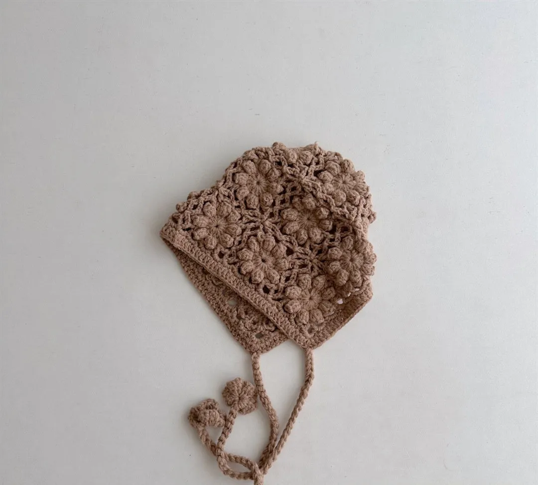 Breathable lace-up earflap winter hat for girls in beige with dome crown and jacquard weave