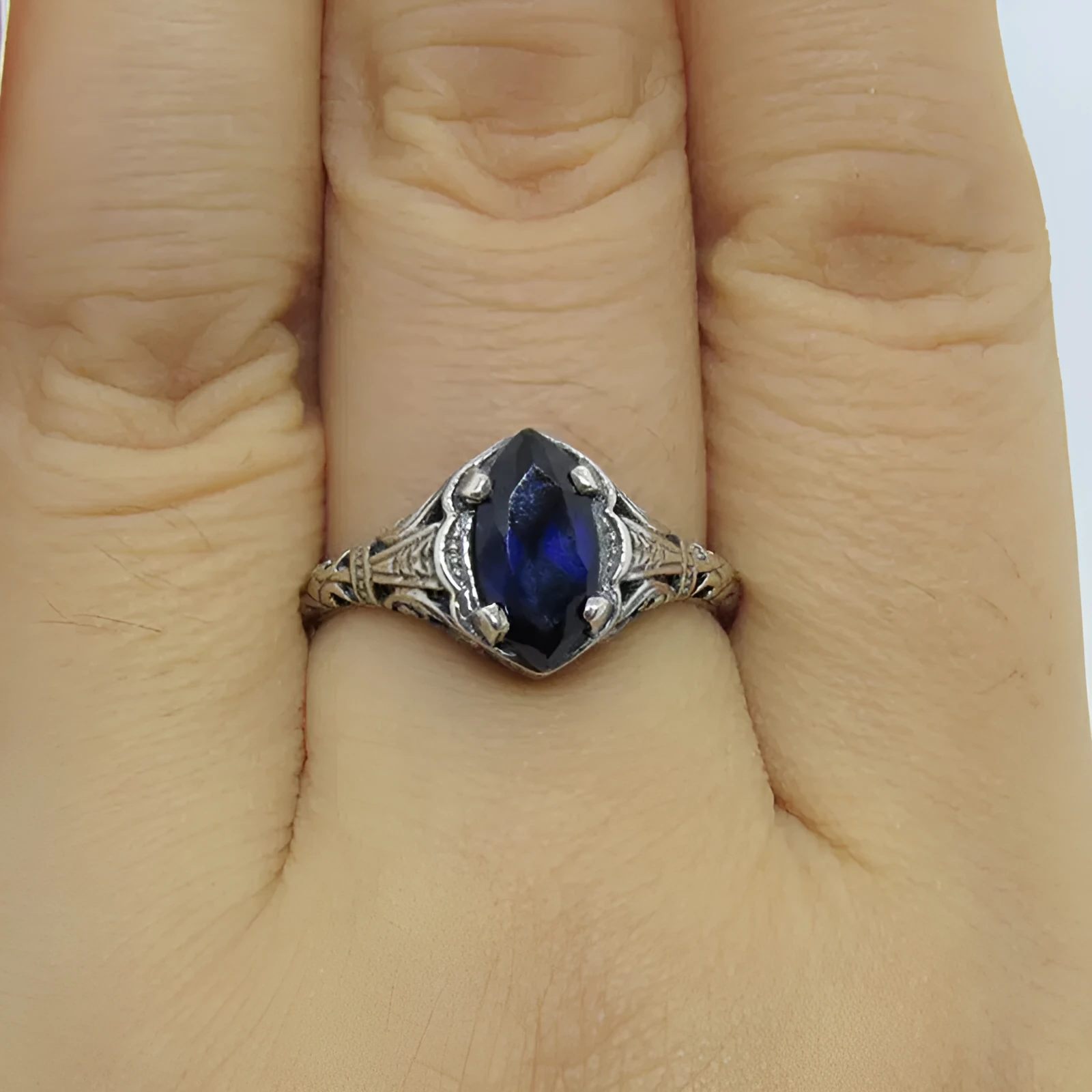 Women's silver geometric hollow ring with zircon stones on alloy base