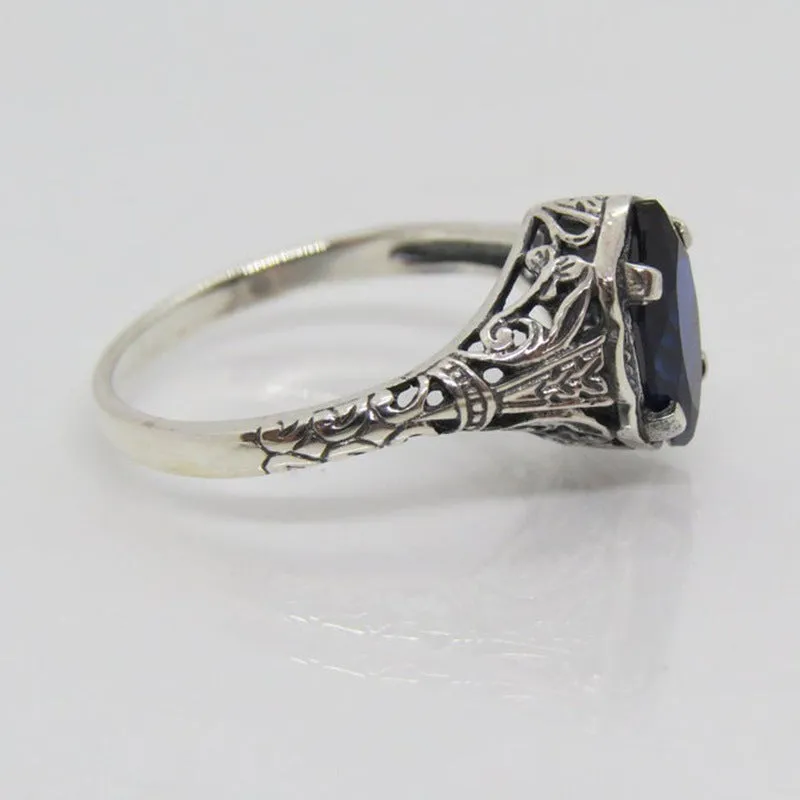 Women's silver geometric hollow ring with zircon stones on alloy base