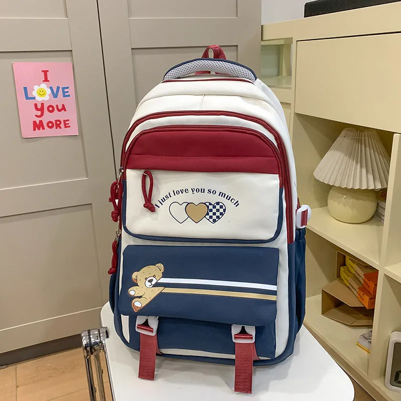 Nylon burden alleviation backpack for girls in pink long leg cloud design with outer sandwich pocket and stitching details