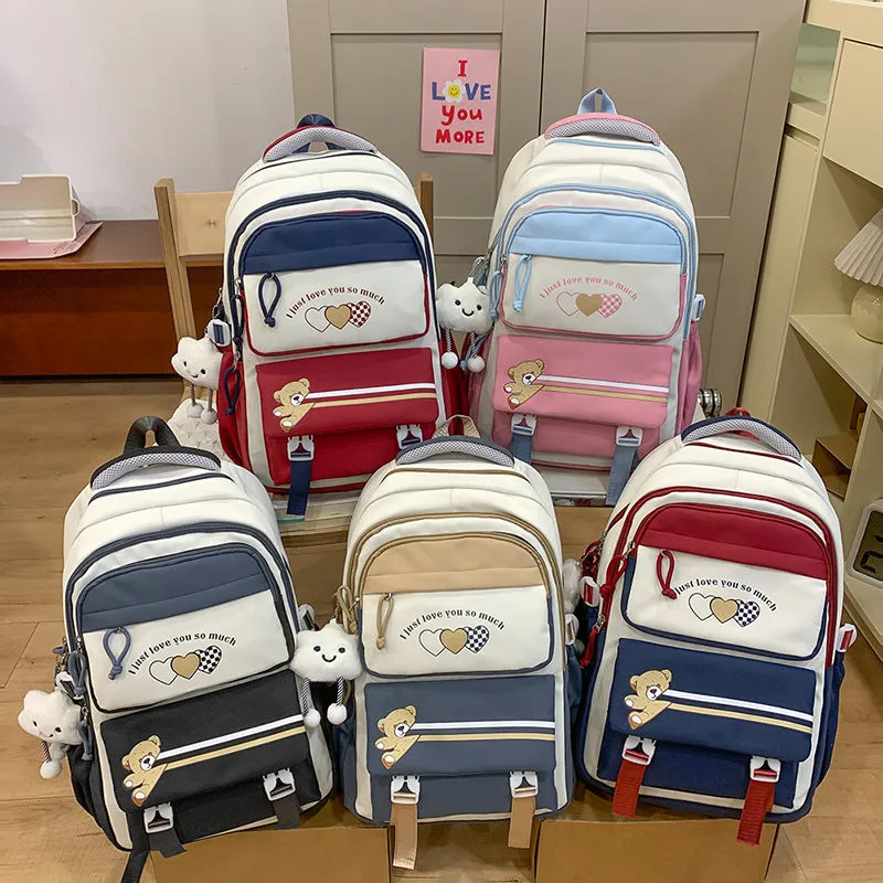 Nylon burden alleviation backpack for girls in pink long leg cloud design with outer sandwich pocket and stitching details