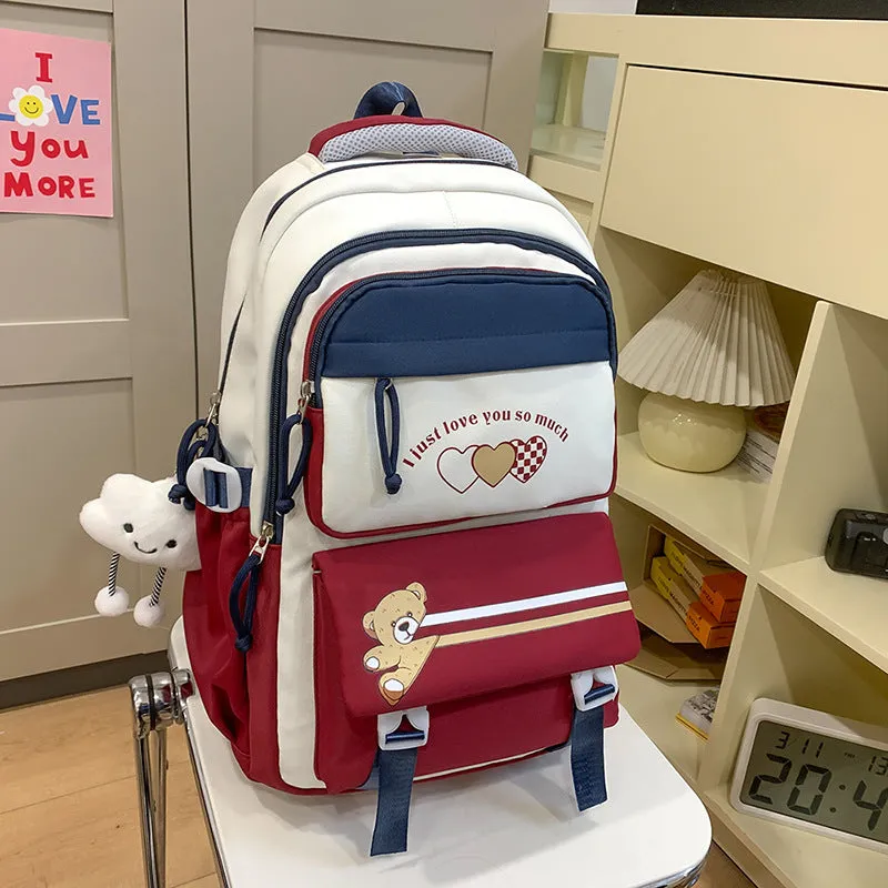 Nylon burden alleviation backpack for girls in pink long leg cloud design with outer sandwich pocket and stitching details