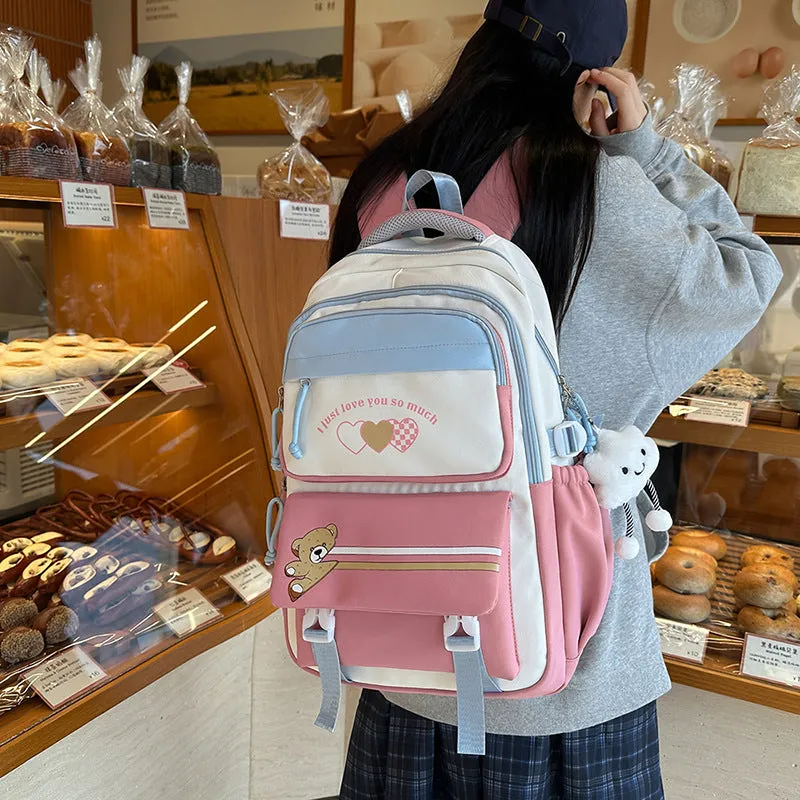 Nylon burden alleviation backpack for girls in pink long leg cloud design with outer sandwich pocket and stitching details