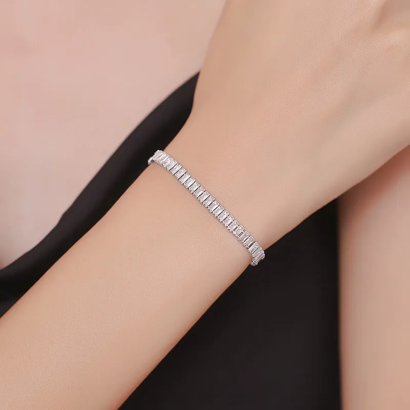 Rectangular brass women's bracelet with diamond zircon treatment in champagne gold colour