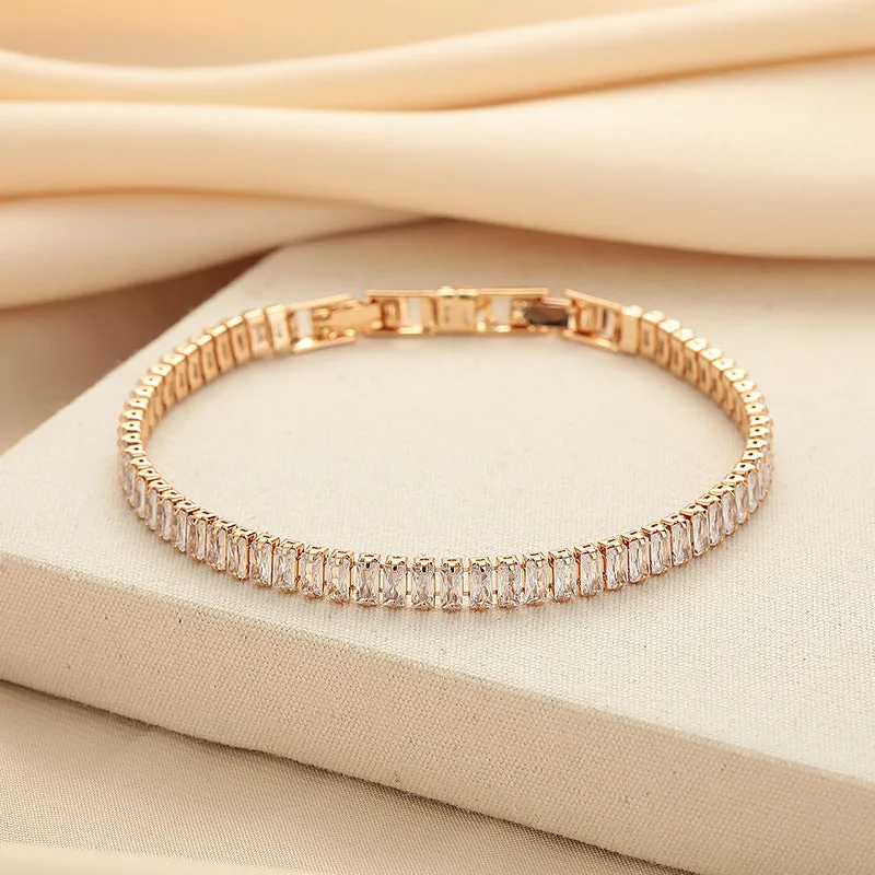 Rectangular brass women's bracelet with diamond zircon treatment in champagne gold colour