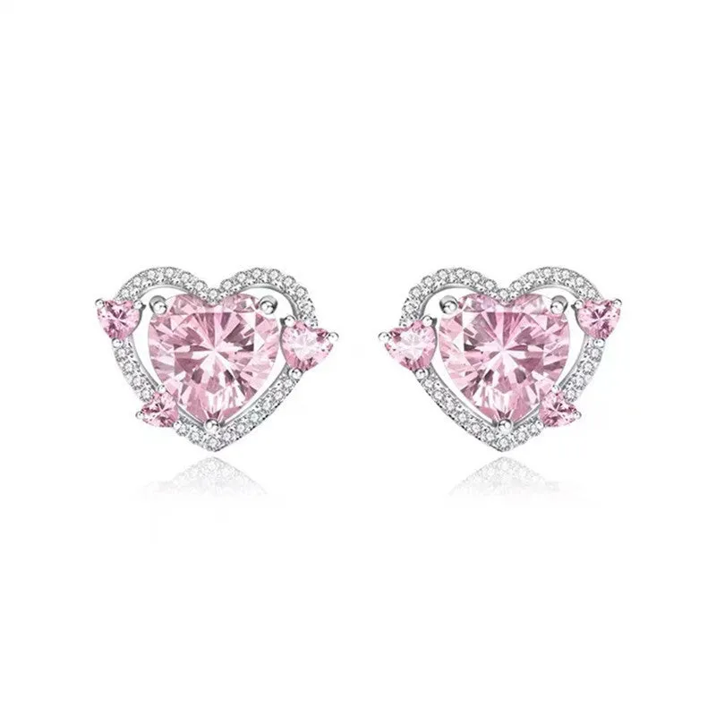 Women's white gold tone heart stud earrings with electroplated copper construction