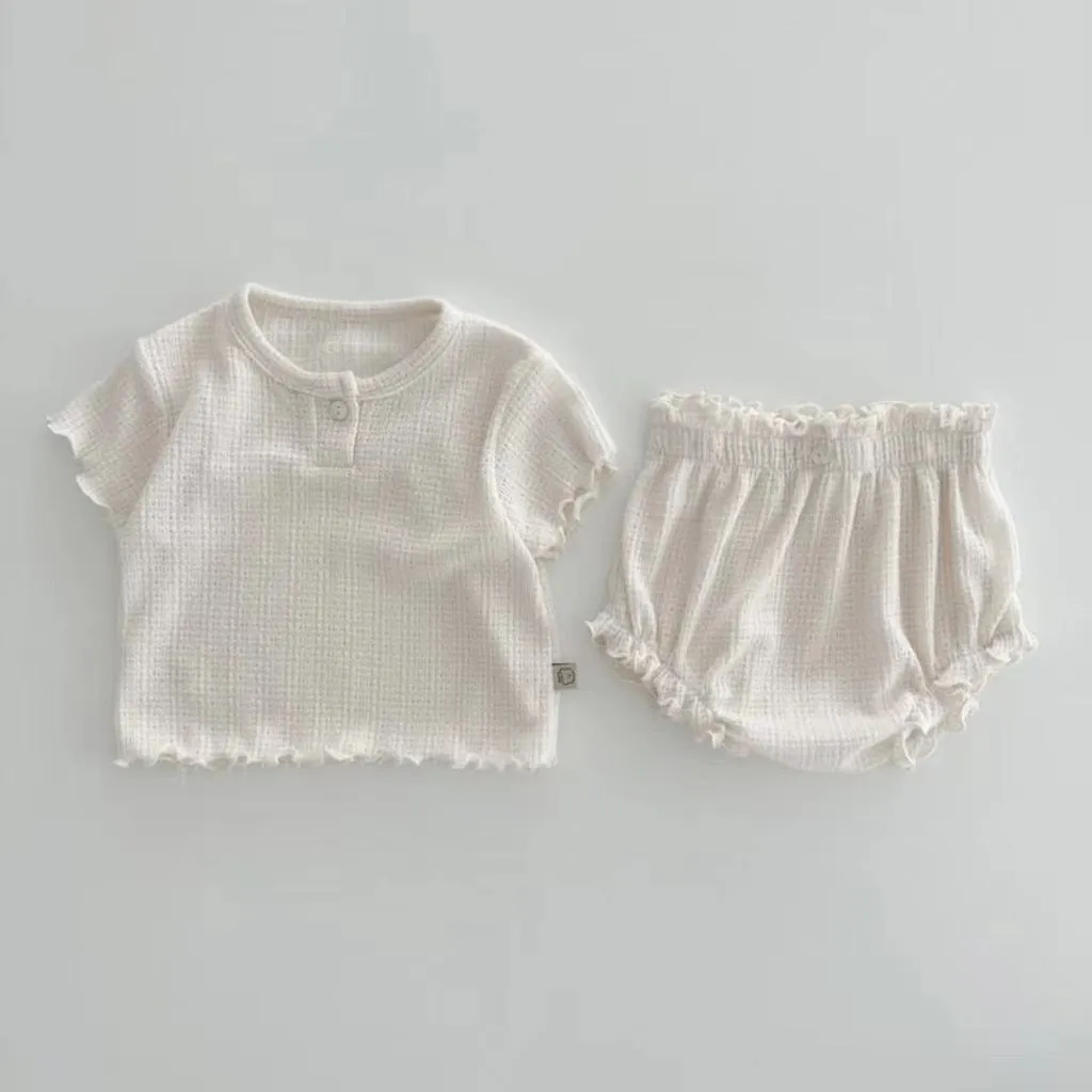 Cotton baby two-piece set with short sleeve top and shorts in light pink
