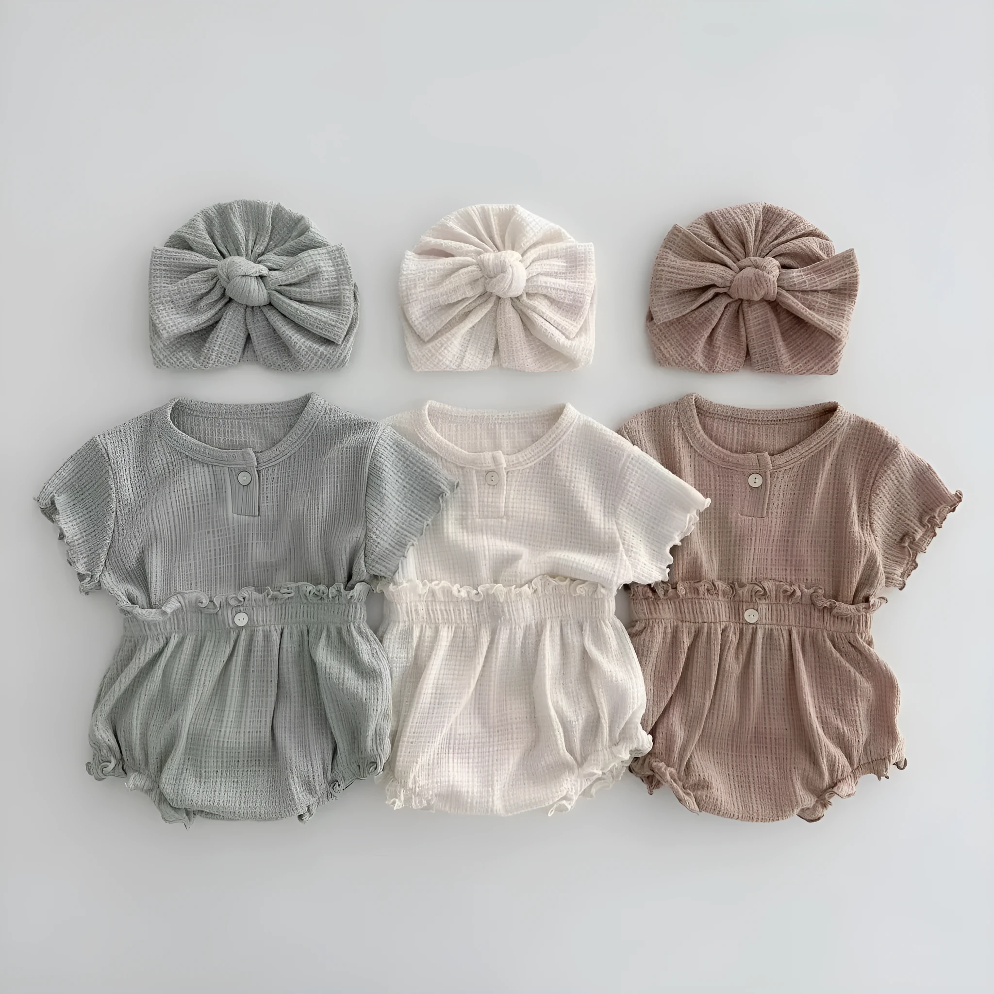 Cotton baby two-piece set with short sleeve top and shorts in light pink